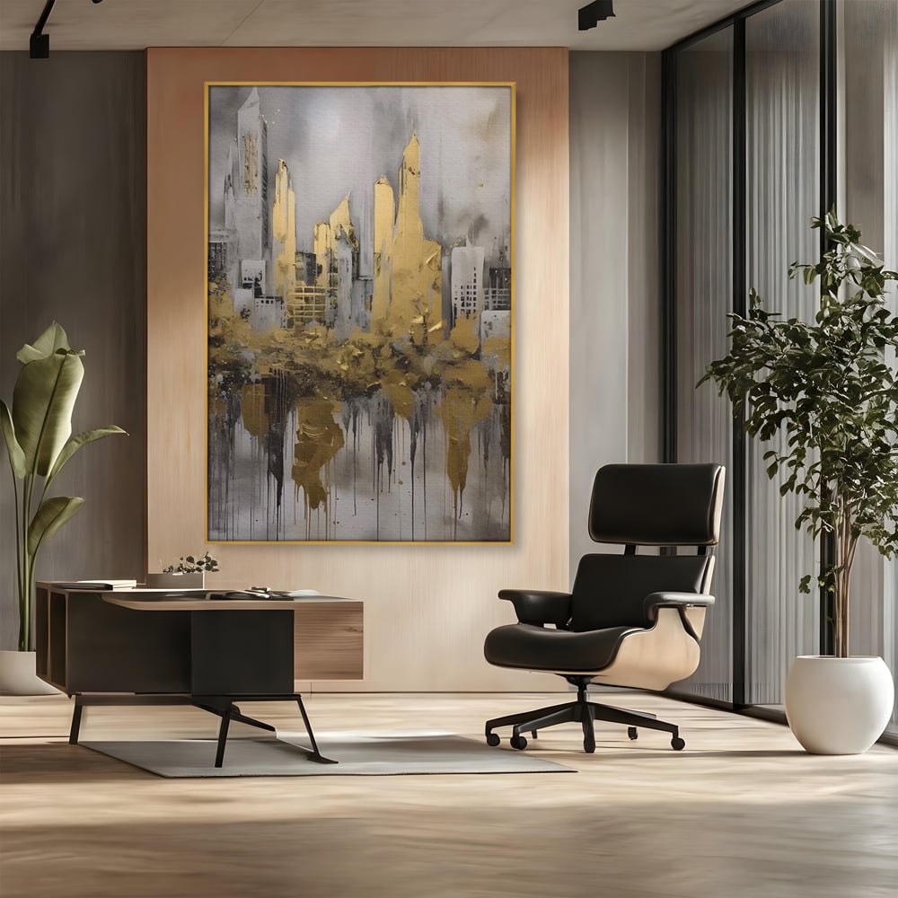 Tablou canvas cu tablou canvas cu zgarie-nori aurii, in rama de aluminiu auriu, pe perete intr-un birou
